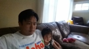 Jon and his 2-year old niece Elyse watching an animated movie on March 15, 2015 in San Mateo, California.